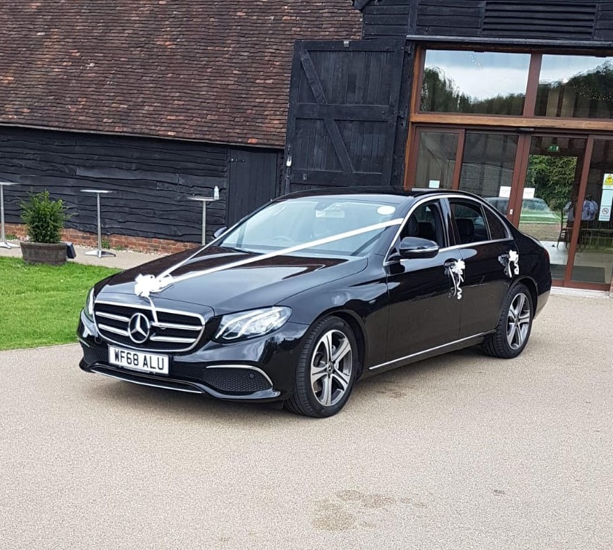 mercedes-sedan-at-a-wedding-venue