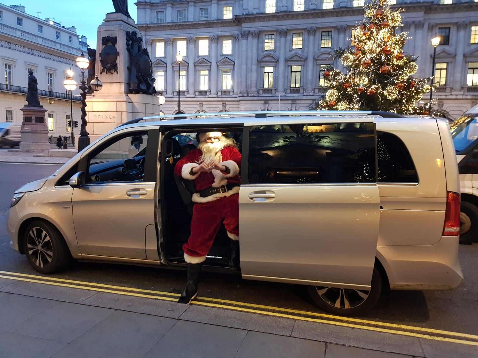 santa-claus-posing-with-imperial-ride-vehicle