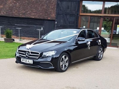 mercedes-sedan-at-a-wedding-venue