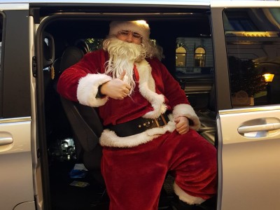 santa-claus-happily-sitting-in-imperial-ride-vehicle